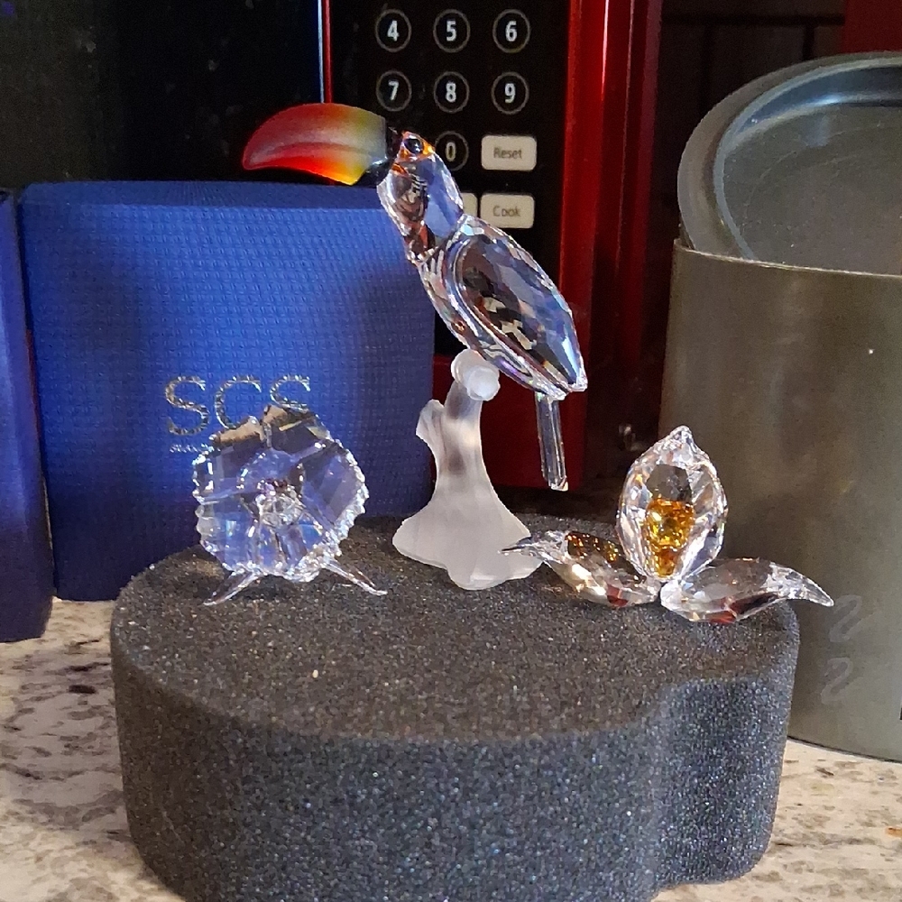 Swarovski Crystal Toucan with Vibrant Beak and Leaf Accents